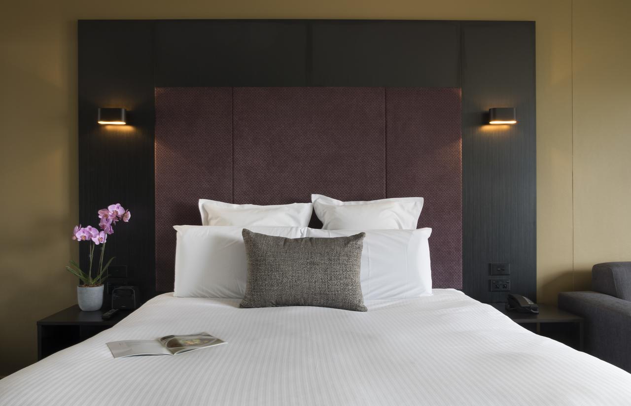 悉尼铂尔曼海德公园酒店 外观 照片 A bedroom at the hotel